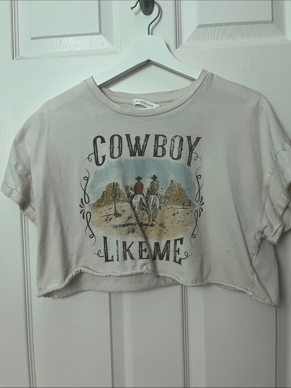 Altar’d State “Cowboy Like Me” cream crop top